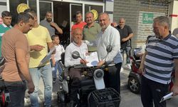 Adana'da 14 engelliye akülü araç desteği