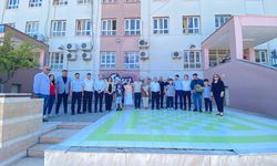 Kozan'da bursluluk sınavında tam puan alan 2 öğrenci ödüllendirildi