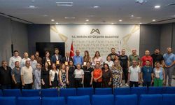Mersin’de görevde yükselen personele plaket ve teşekkür belgesi
