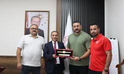 Geleneksel Spor Dalları Federasyonu Asbaşkanı Hopur’dan Müdür Baydur’a Ziyaret