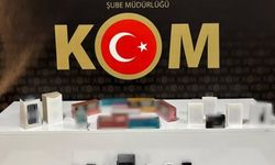 İş yerine yapılan baskında çok sayıda kaçak ürün ele geçirildi