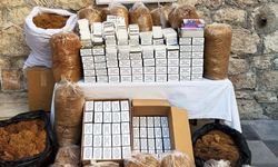 Mersin'de iş yerinde kaçak tütün ürünleri ele geçirilen zanlı gözaltına alındı