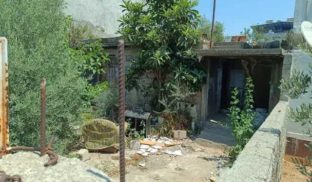 Adana'da oğlu tarafından sopayla darbedildiği iddia edilen kadın hayatını kaybetti