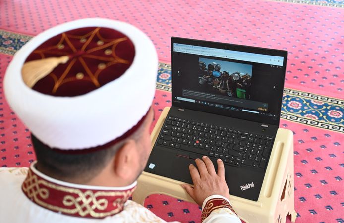 Kadirli İlçe Müftüsü Etik ve din görevlileri, AA'nın 'Yılın Kareleri' oylamasına katıldı